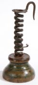 A wrought-iron and painted beech spiral candleholder, French, circa 1800 The holder formed from a