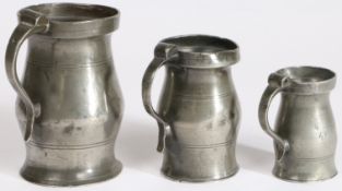 Two Victorian pewter Imperial lidless baluster measures, Aberdeen, circa 1840 To include a half-pint