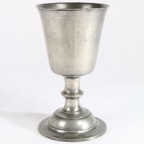 A large George III pewter communion cup, Scottish, circa 1800 The deep flared and straight-sided