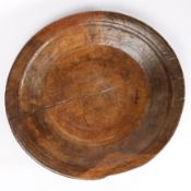 A shallow sycamore dairy bowl/platter, circa 1800 With decorative ring -urned gently sloping sides