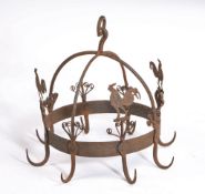 An 18th century style wrought-iron game crown-hanger Of typical domed cruciform design, with hanging