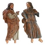 Two 17th century walnut and polychrome-decorated appliqués of saints, German/Swiss Each modelled
