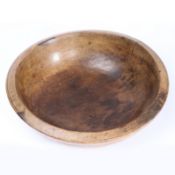 A George III sycamore dairy bowl, circa 1800 With broad canted rim, and decorative ring turnings,