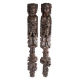 A large and impressive pair of 17th century oak figural terms Each carved as a female, with