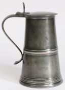 A George III pewter flat-lid flagon, Scottish, circa 1785-1800 Having a truncated cone body with