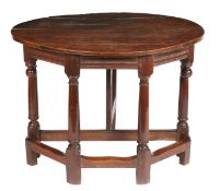 A Charles II oak credence type-table, with single rear drop-leaf, probably Cumbrian, circa 1680