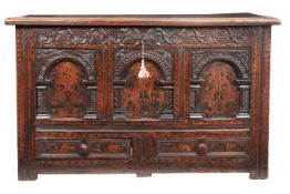 A Charles II oak and inlaid coffer, with drawer, Yorkshire, circa 1660 Having a triple boarded