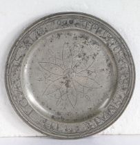 A good and documented Queen Anne pewter multiple-reeded wrigglework plate, circa 1700 The rim
