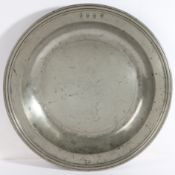 A rare William & Mary pewter multiple-reeded rim dish, Yorkshire, circa 1690 Having a relatively