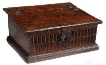 A James I boarded oak desk box, circa 1620 Having a gently sloping top, the one-piece hinged lid