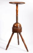 A George III elm and ash turner’s adjustable tripod stand, Welsh, circa 1800 Having a circular