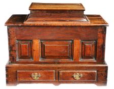 A George III oak coffor bach, circa 1760 The well-figured top with an additional, probably 19th
