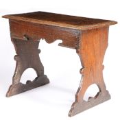 An Elizabeth I large oak boarded stool, circa 1600 and later Having an impressive one-piece top with