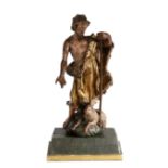A 17th -early 18th century polychrome decorated figure of John The Baptist Standing, wearing a
