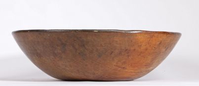 A good and large George III sycamore dairy bowl, circa 1800 With rounded rim and flat base, diameter