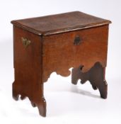 A highly unusual William & Mary oak boarded box-stool, circa 1690 Having a sliding one-piece top