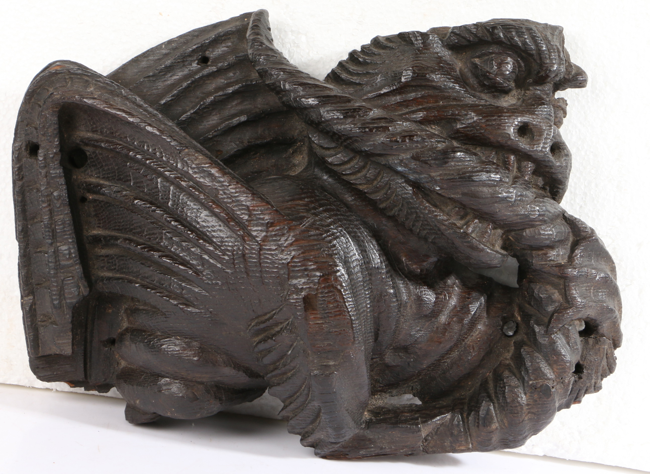 A rare 15th century oak dragon-carved boss, English, circa 1400 The snarling, winged beast clenching - Image 2 of 3