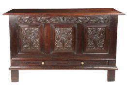 A Charles II oak coffer with drawer, Lancashire, circa 1670 Having a triple boarded hinged lid