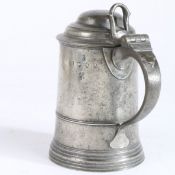 A rare George I/II pewter OEWS quart domed-lidded tankard, circa 1720-30 The straight-sided tapering