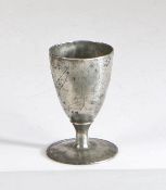 A rare and documented Charles II pewter wrigglework footed ‘wine' cup, circa 1680 The conical egg-