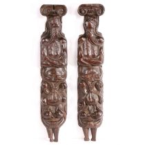 An unusual pair of late 16th century oak terms, circa 1580 Each male, wearing a round-brimmed cap,