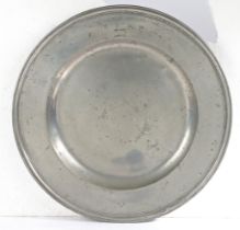 An early 18th century pewter multi-reeded charger, Somerset, circa 1700-20 The semi-broad rim with