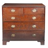 A George III solid burr-elm chest of drawers, circa 1800 Having an impressive single-piece top,
