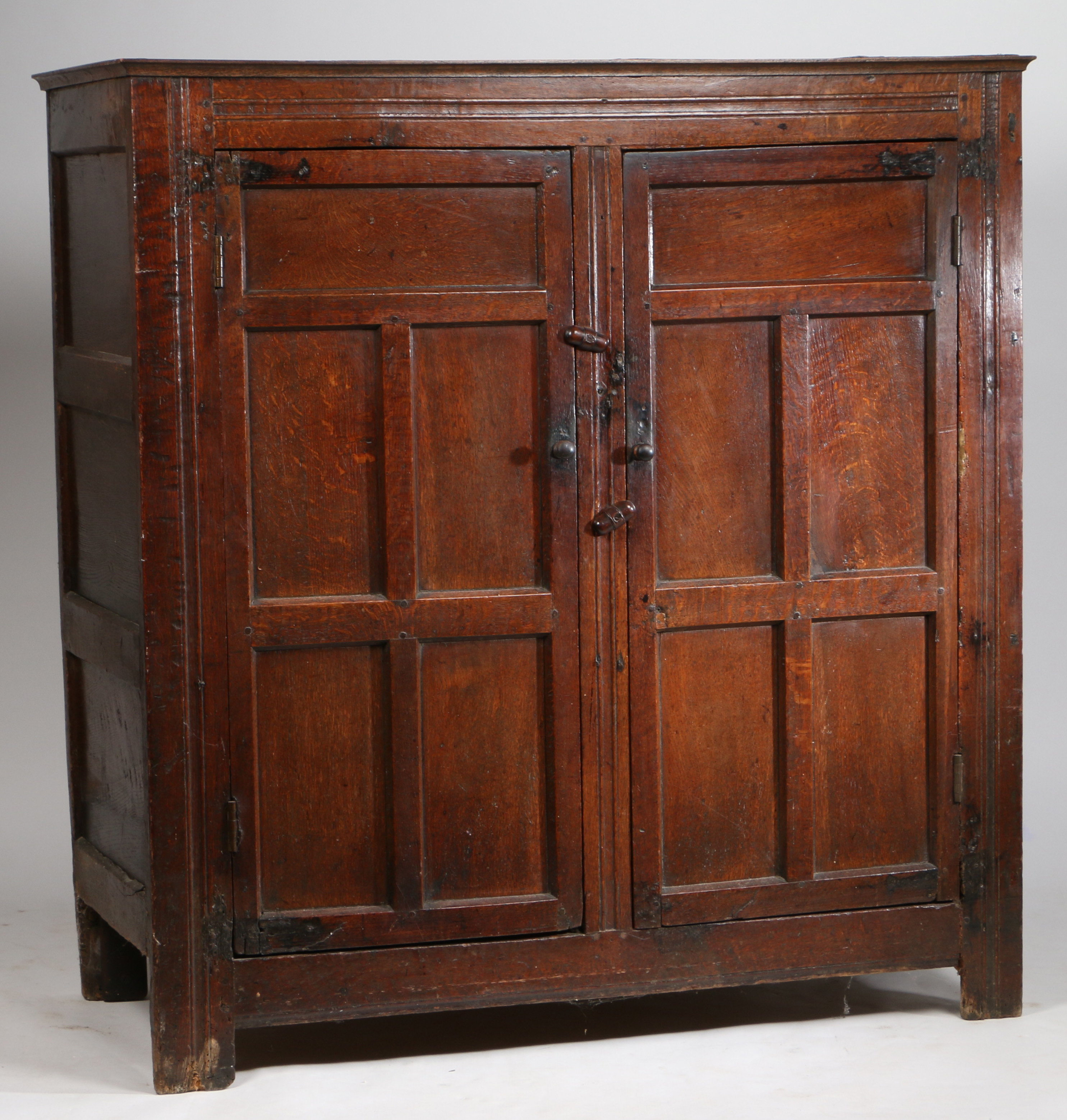A late 17th Century oak livery cupboard Having a pair of five-panelled cupboard doors, on extended - Image 2 of 2