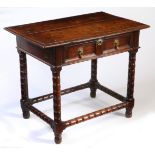 A good Charles II oak side table, circa 1670 The top of two ovolo-moulded boards, the frieze
