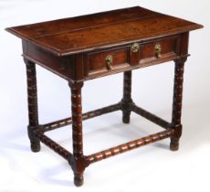 A good Charles II oak side table, circa 1670 The top of two ovolo-moulded boards, the frieze
