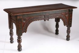 An unusual early 17th Century oak and polychromed ‘stand’, Dutch The one-piece top with ovolo-