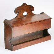 A particularly wide George III oak mural candle and spill box, circa 1800 The backboard with a