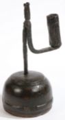 A wrought-iron and wooden combined rushlight and candleholder, Welsh, possibly Caernarvonshire or