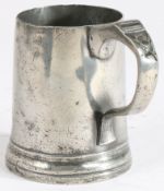 A George III pewter OEWS pint mug, circa 1820 Having a plain truncated cone drum, moulded footrim