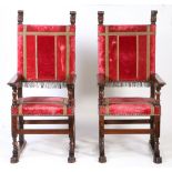 A pair of large late 16th century walnut and upholstered armchairs, French, circa 1600 Each having a