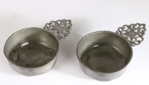 A rare pair of William & Mary pewter porringers, circa 1700 Each having a straight-sided bowl,