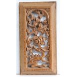 A 16th century carved oak panel Carved and pierced in high-relief, designed with dragon issuing