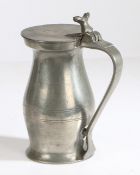 An early 18th century pewter OEWS quart bud baluster measure, English, circa 1700-20 With maker’s