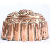 A Victorian Benham & Froud copper jelly mould, circa 1850 Of oval lobed form, surmounted by an