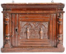 An unusual small mid-17th century oak and pine table cabinet, English, circa 1650 Having a single