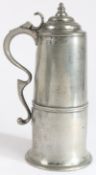 A rare George III pewter spire flagon, Devon, circa 1780 Having a drum slightly bulging around the