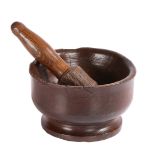 An 18th century ash mortar, with original pestle, English Of squat tulip-shaped form, with short