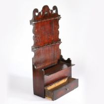 A George III oak spoon and candle box, Lancashire, circa 1790 The tall backboard with scroll and