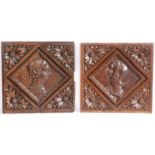 A pair of Henry VIII oak Romayne-type panels, circa 1530 One carved with a male bust profile,