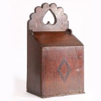 Folk art interest: an early 19th century oak and inlaid mural candle box, Welsh The back plate