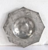A rare Henry VIII pewter octagonal-shaped saucer, circa 1540 The broad rim with slightly convex