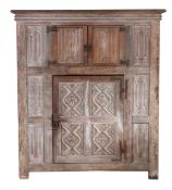 A 16th century style oak livery cupboard, circa 1900 In the Wardour Street manner, English, with