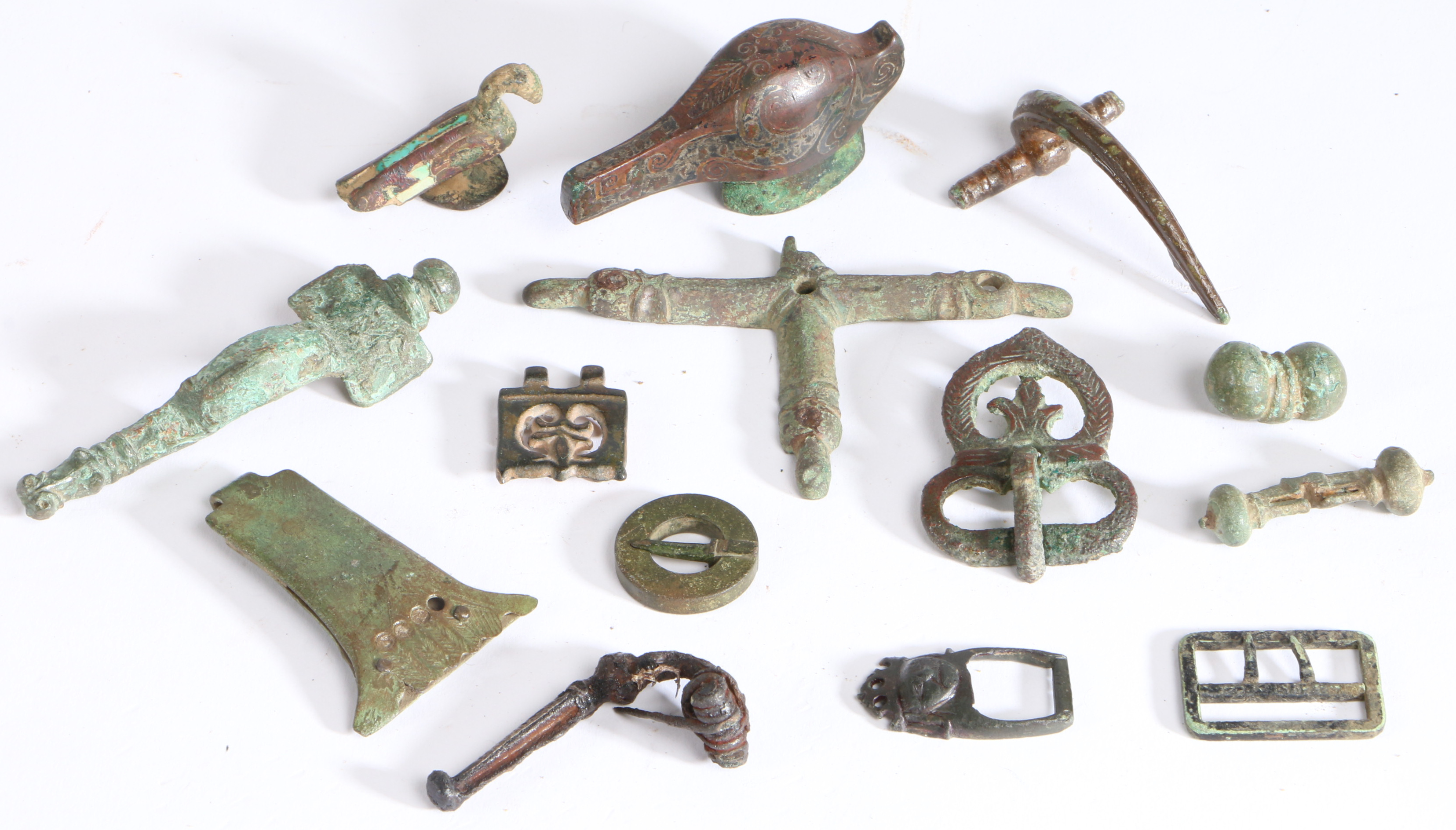 A collection of Anglo-Saxon/Medieval copper-alloy artefacts To include clothes fastenings, hooks,