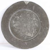 A rare Charles II pewter paten, circa 1680 With broad incised multiple reeded rim, and flat well,
