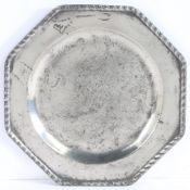 A rare George III pewter octagonal plate, circa 1775 The rim with applied gadrooned edge, traces